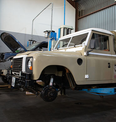 Vechicle being refurbished on workshop floor